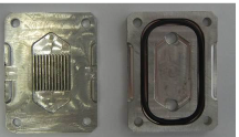 Solar Cell Cooling and Heat Recovery in a Concentrated Photovoltaic System
